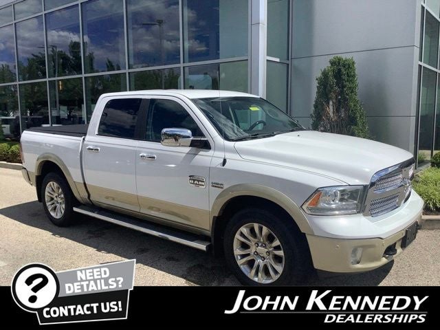 2016 RAM 1500 Laramie Longhorn in Bright White Clearcoat — front three-quarter view