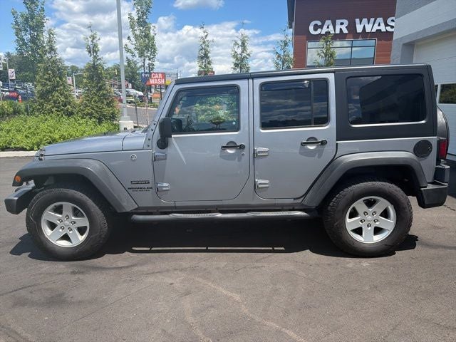 2017 Jeep Wrangler — rear three-quarter view