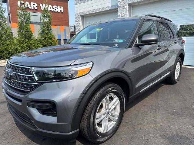 2023 Ford Explorer XLT in Gray Metallic — front three-quarter view