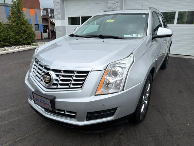 2015 Cadillac SRX Luxury in Radiant Silver Metallic — front three-quarter view