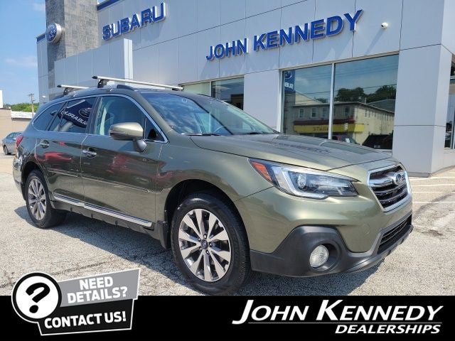 2019 Subaru Outback 2.5i Touring in Wilderness Green Metallic — front three-quarter view