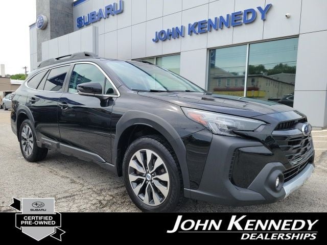 2023 Subaru Outback Limited in Crystal Black Silica — front three-quarter view
