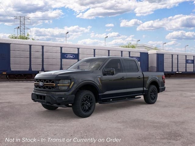 2026 Ford F-150 Tremor in Agate Black Metallic — front three-quarter view