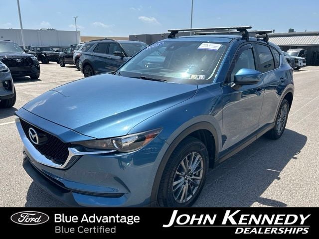 2017 Mazda Mazda CX-5 Touring in Eternal Blue Mica — front three-quarter view