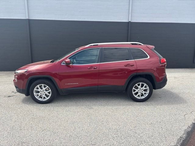 2016 Jeep Cherokee Latitude in Deep Cherry Red Crystal Pearlcoat — front three-quarter view