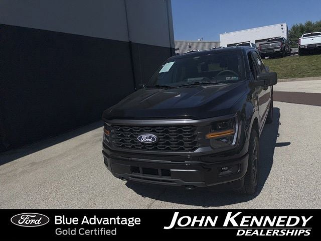 2025 Ford F-150 STX in Black Metallic — front three-quarter view