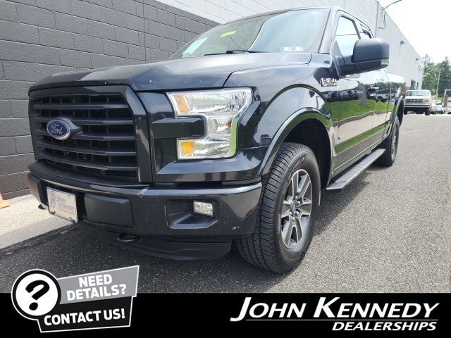 2015 Ford F-150 XLT in Tuxedo Black Metallic — front three-quarter view