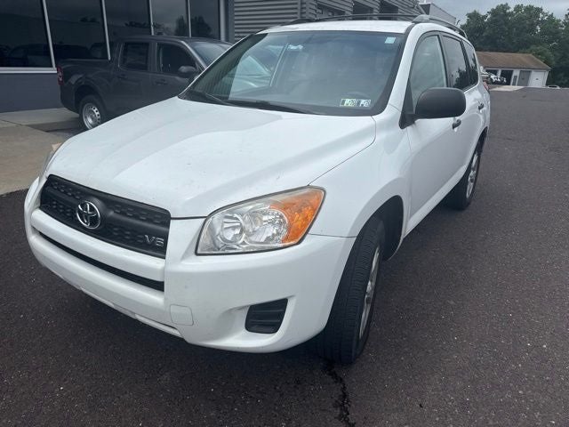 2009 Toyota RAV4 Base in White — front three-quarter view