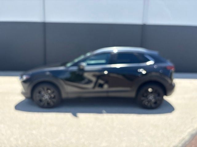 2025 Mazda Mazda CX-30 2.5 S Select Sport in Jet Black Mica — front three-quarter view